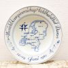 Ceramic plate commemorating the 1960 Womens Field Handball World Championship in the Netherlands.