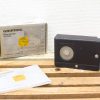 Vintage Grundig YP-2000 world receiver, sleek design with original box and manual included.