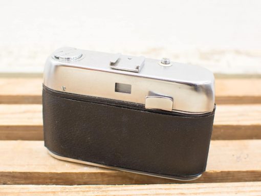 Vintage Halina Paulette camera from 1965, beautifully crafted with classic metallic and leather design.