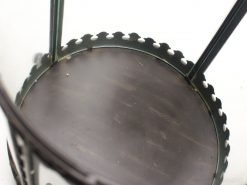 Elegant lantern with glass panels and a decorative metal edge for stylish ambiance.