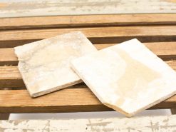 Rustic handmade tiles in light beige for vintage decor and renovation projects.