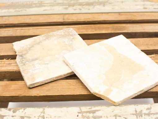 Rustic handmade tiles in light beige for vintage decor and renovation projects.