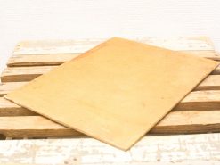 Rustic wooden board for serving, crafting, or decorative use in any space.