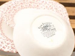 Elegant Rose Bouquet china set featuring an ornate bowl and floral dinner plates.