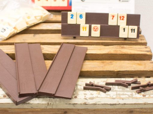 Rummikub game set with vintage tiles and joker, ideal for family game nights.