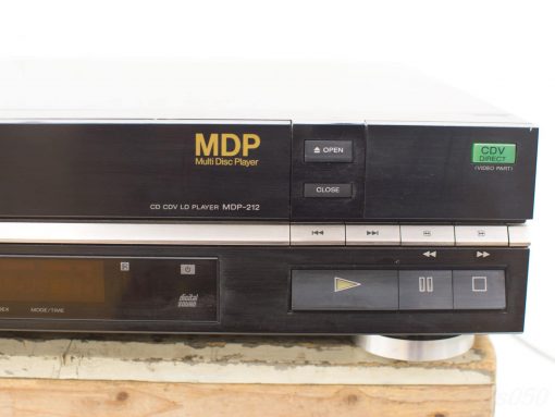 Vintage MDP-212 multi-disc player with sleek black design, golden accents, and versatile playback options.