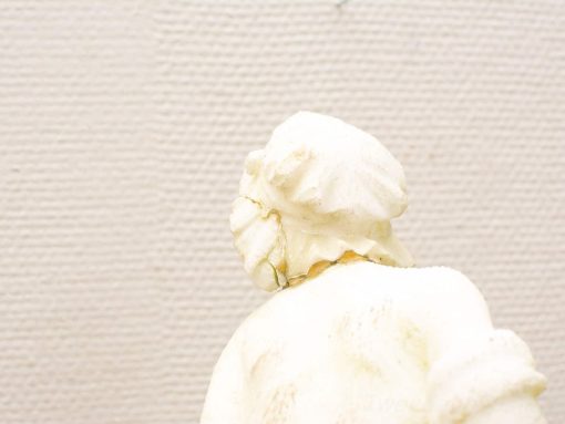 Elegant female sculpture in light stone, embodying serenity and artistic beauty for any space.