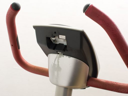 Close-up of vintage Batavus stationary bikes ergonomic, padded red handlebars for comfort and grip.