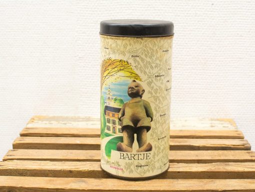 Vintage Bartje tin with whimsical child figure and nature design, perfect for collectors.