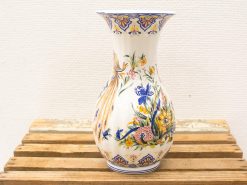 Elegant ceramic vase with vibrant hand-painted floral designs, perfect for any home decor.