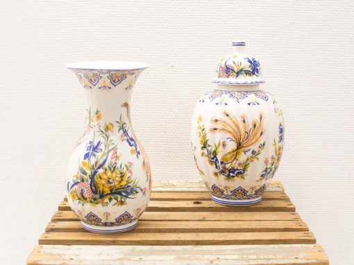 Colorful vintage floral vase and urn with decorative motifs, perfect for stylish decor.