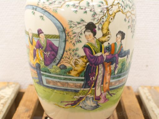 Elegant hand-painted Chinese vase featuring serene nature scene and traditional figures.