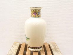 Elegant hand-painted Chinese vase with vibrant floral motifs and a glossy finish.