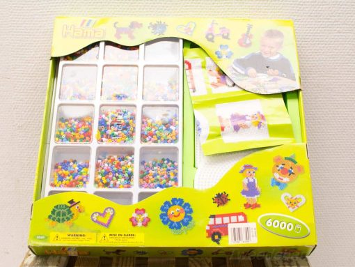 Hama bead art kit with 6000 colorful beads for creative fun and skill development.