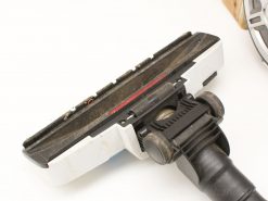Used Koenic vacuum head with wheels and brushes for efficient floor and carpet cleaning.