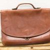 Classic cognac leather shoulder bag, perfect for stylish professional and casual use.