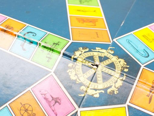 Classic vintage trivia board game with colorful sections and an ornate spinner for family fun.