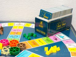 Colorful vintage Trivial Pursuit game featuring vibrant pieces and an elegant card box for family fun.