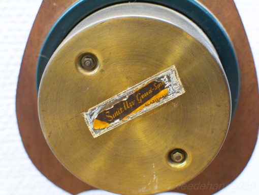 Vintage phonograph mechanism by Smith & Gray & Son showcases exquisite craftsmanship and nostalgic design.