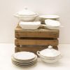 Elegant porcelain dishware with gold accents, perfect for special occasions and refined dining experiences.