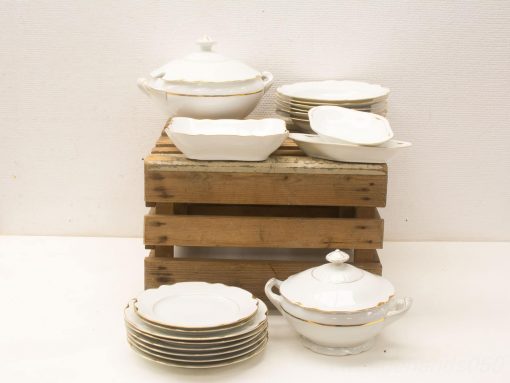 Elegant porcelain dishware with gold accents, perfect for special occasions and refined dining experiences.