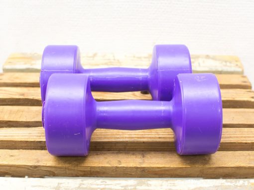 Purple 5 lbs dumbbells for stylish and functional workouts; perfect vintage fitness accessories.