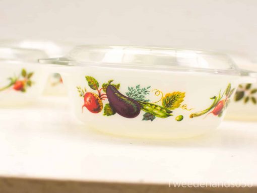 Elegant glass baking dish with vibrant vegetable motifs for stylish vintage cooking.