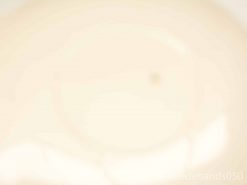 Elegant cream ceramic bowl, reflecting vintage charm and simplicity for refined table settings.