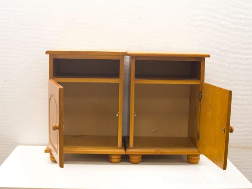 Charming light wood cabinet with dual compartments and rustic design for stylish storage.