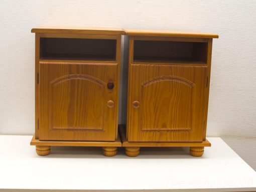 Charming wooden bedside cabinets with rounded edges, perfect for functional and stylish home decor.