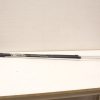 Lightweight trekking poles with ergonomic grips and rubber tips for stable outdoor adventures.