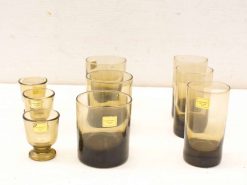 Stunning vintage amber glass collection, perfect for drinks and elegant table settings.