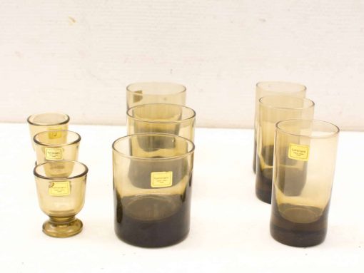 Stunning vintage amber glass collection, perfect for drinks and elegant table settings.