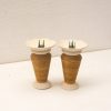 Elegant vintage vases with earthy texture and floral accents, perfect for any interior decor.