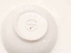 Elegant porcelain plate with wildflower design, ideal for collectors and special occasions.