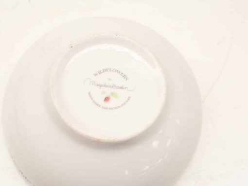Elegant porcelain plate with wildflower design, ideal for collectors and special occasions.