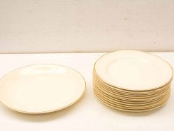 Elegant white plate set with gold rim, perfect for special occasions and stylish dining.