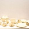 Elegant cream vintage dinnerware set for stylish dining occasions.