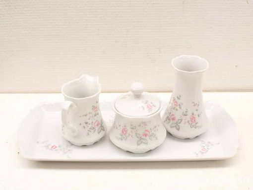 Elegant floral porcelain tea set ideal for afternoon tea or as decorative home decor.