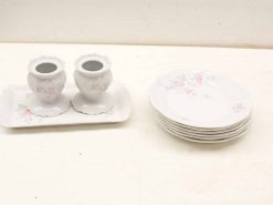 Elegant vintage 40-piece china set with floral design, perfect for special occasions and dining.