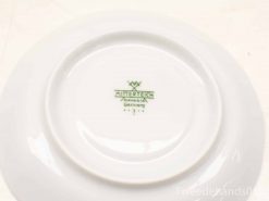 Elegant Mitterteich porcelain plate from Bavaria, Germany, with intricate green marking.