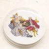 18th-century porcelain plate featuring an elegant couple sharing music at a luxurious piano.