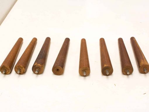 Vintage wooden rods with unique textures, perfect for decor or craft projects.