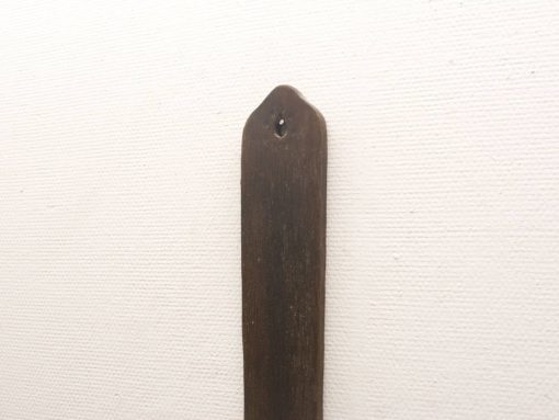 Rustic wooden hanging decor with a polished finish and rounded tip, perfect for showcasing craftsmanship.