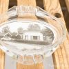 Vintage shell glass dish featuring black-and-white suburban scene photograph from the mid-20th century.