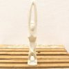 Elegant white female figure sculpture, showcasing beauty and serenity in minimalist design.