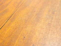 Elegant wooden surface showcasing unique grain patterns and warm hues for timeless charm.