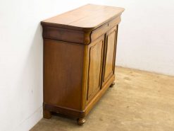 Classic wooden sideboard with elegant details and ample storage for any interior design.