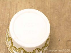 Elegant white ceramic pot from Bassano, Italy, featuring green floral designs.
