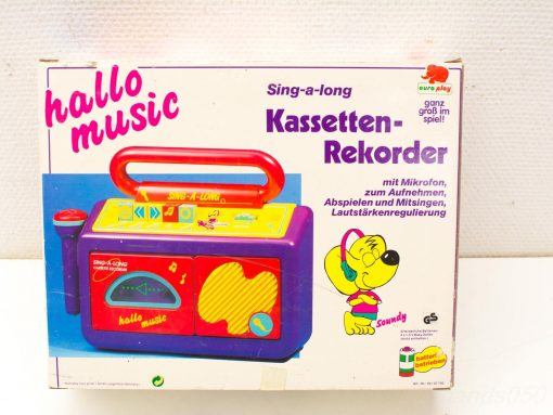 Colorful Sing-a-long cassette recorder for kids with microphone, buttons, and fun cartoon dog.